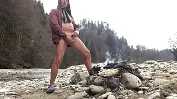Play Springbreaker nudist with cock ring at a bonfire